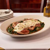 Veal Saltimbocca · Thin Sliced Veal on a Bed of Sautéed Spinach Topped w/ Prosciutto & Melted Mozzarella in a M...