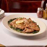 Veal Scaloppine With Lemon And Butter · Thin Sliced Veal Scaloppine Sautéed in a Lemon & Butter Sauce 
