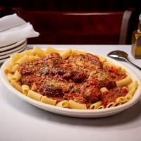 Pasta With Ragu · A Mixture of Shredded Beef, Meatballs, Pork Braciola & Italian Sausage - Slow-Cooked in a Ri...