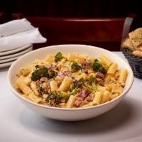 Country Style · Rich & Buttery Sauce Consisting of Pork Sausage, Prosciutto, Chicken Stock, Cannellini Beans...