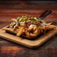 Trainwreck Fries (Small) · Melted Cheddar, Jack Cheese, Smoked Bacon, Scallions, & Jalapenos with Ranch Dressing