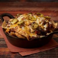 BBQ Nachos (Small) · Barbecued Pulled Chicken, Carolina Pulled Pork, Texas Beef Brisket, Cheese & Jalapenos

