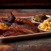 1/4 Rack Memphis Rib Plate · Dry Rubbed & Hickory Smoked Ribs - Served w/ Choice of Two Small Sides & Cornbread