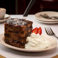 Bread Pudding · Toasted Italian Bread w/ golden Raisins, Chocolate Chips, Soaked in a Custard Consisting of ...