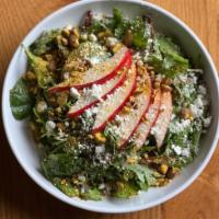 Pear Salad · Baby red chard, kale, arugula, pear, shaved fennel, goat cheese, toasted almonds, pomegranat...