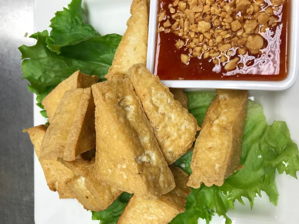 8 Piece Fried Tofu · Served with sweet chili sauce and peanut on top.