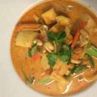 Palace Curry · Tofu, avocado, pineapple, potato, bell pepper, onion in massaman curry with peanut on top se...