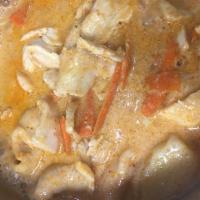 Massaman Curry · Curry paste with coconut milk, potato, carrot, onion and peanut on top. Served with steamed ...