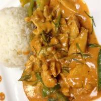 Panang Curry · Panang curry paste in coconut milk cooked with green bean and bell pepper. Served with steam...