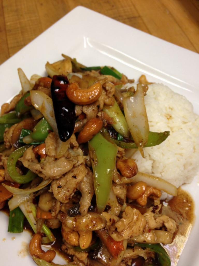 Cashew Nut · Sauteed onion, bell pepper, mushroom, celery, carrot, dry pepper and cashew nut in brown sauce. Served with steamed rice.
