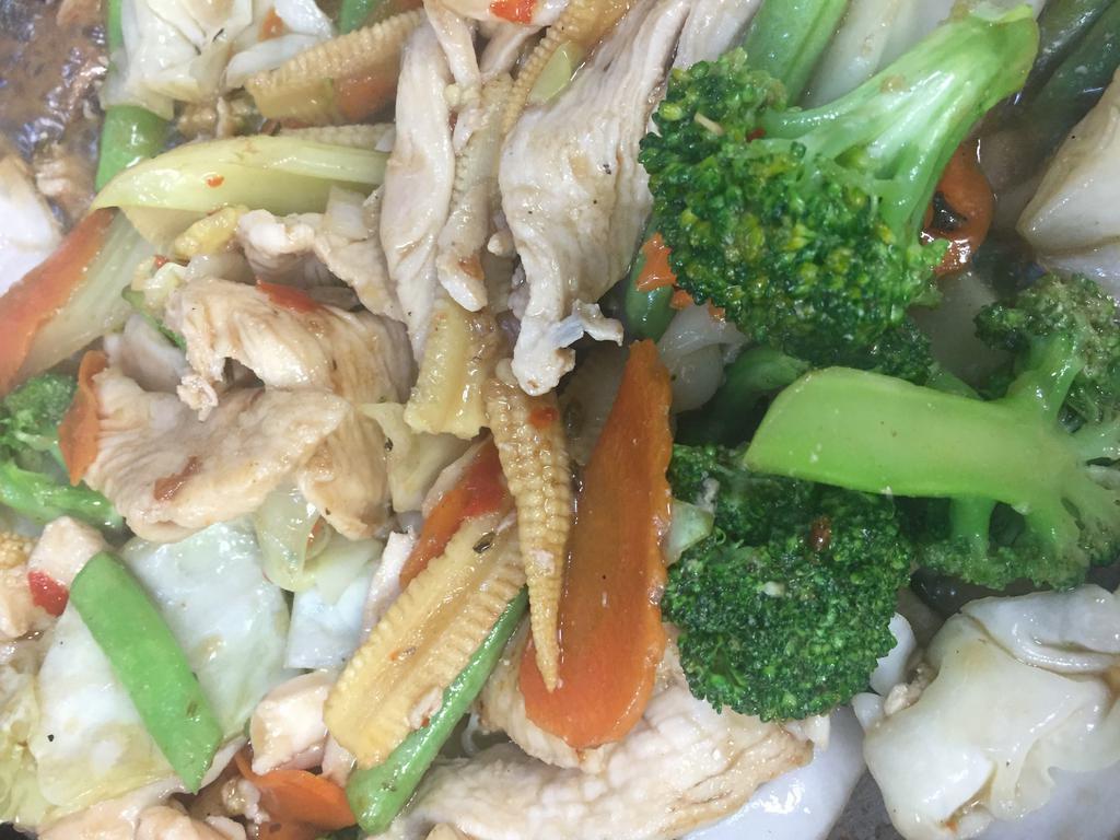 Mixed Vegetables · Sauteed mixed vegetables with light brown sauce cabbage, carrot, mushroom, broccoli, baby corn, green bean, onion. Served with steamed rice.