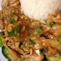 Peanut Chicken · Chicken with special peanut sauce served over steamed vegetable. Served with steamed rice.