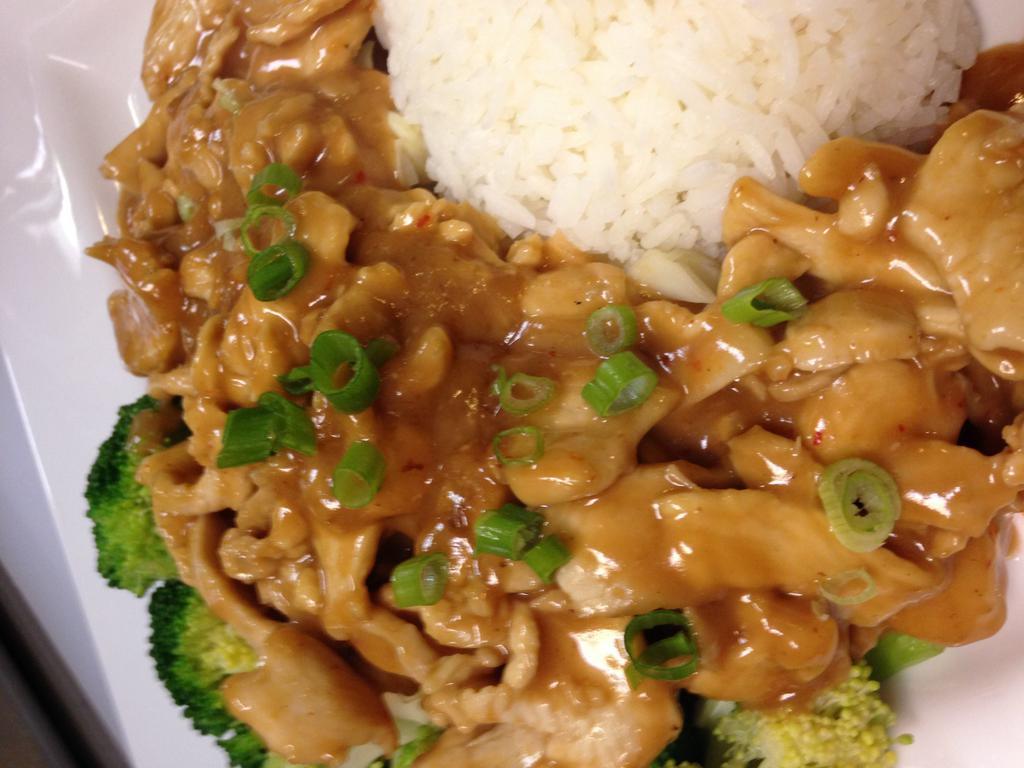 Peanut Chicken · Chicken with special peanut sauce served over steamed vegetable. Served with steamed rice.