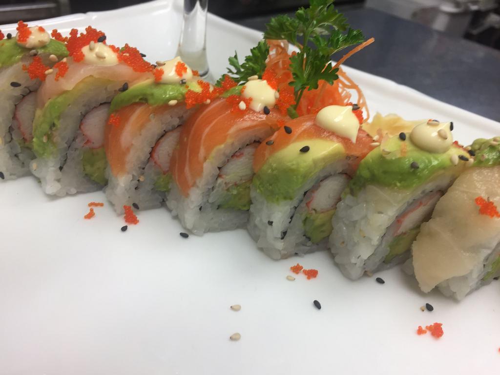 Delight Roll · Tuna, salmon, yellowtail, cucumber, scallion, avocado, asparagus, cream cheese, inside out sesame seed and flying fish egg.