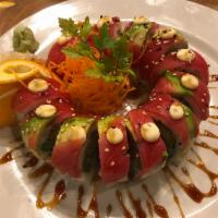 Red Dragon Roll · Inside out. Tempura shrimp, avocado, asparagus, scallion and tuna on top.
