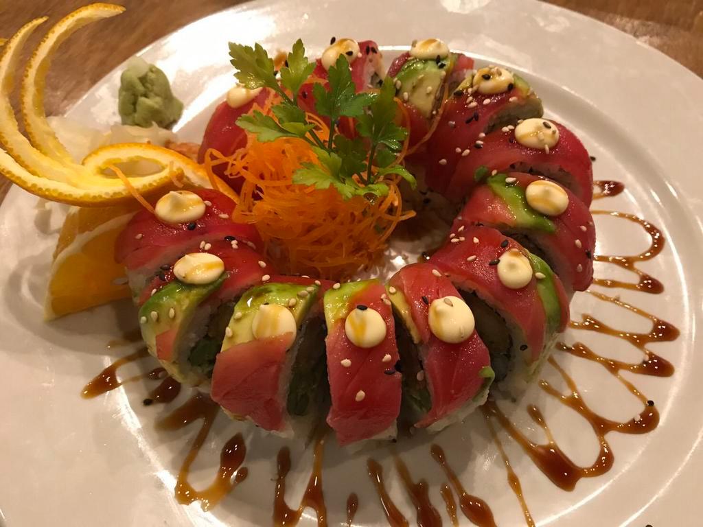 Red Dragon Roll · Inside out. Tempura shrimp, avocado, asparagus, scallion and tuna on top.