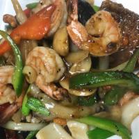 Seafood Black Pepper · With steamed rice. Shrimps, squids, fish, scallop and green mussels with bell pepper, onion,...