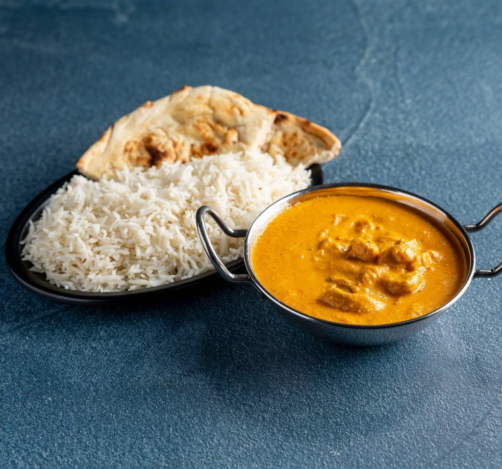 59. Chicken Korma Specialty · Boneless chicken cooked with almonds with a touch of cream.