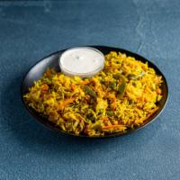 93. Vegetarian Biryani · Classic dish of curried rice with vegetables.