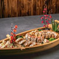 Boat Combo #1 · Gyoza, King Crab, Iron Man, Volcano, Candy Cane

Served with 2 house salads.