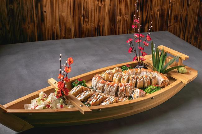 Boat Combo #1.. · Gyoza, King Crab, Iron Man, Volcano, Candy Cane

Served with 2 house salads.