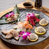 Sashimi Special.. · 20 pieces sashimi with 1 special roll