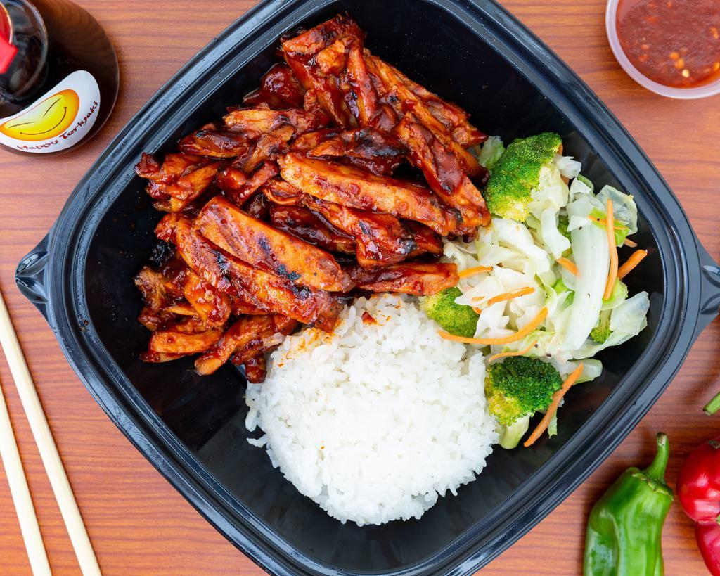 Spicy Chicken Teriyaki · Spicy chicken teriyaki served with rice and steamed vegetables. 