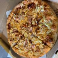 Hawaiian Pizza · Ham, pineapple, crispy bacon, pizza sauce and cheese.