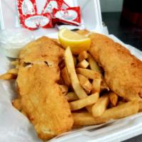 Fish and Chips Dinners · Fried haddock, french fries, lemon, tartar and coleslaw.
