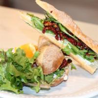 Le Pompidou Sandwich · Soft goat cheese, sun-dried tomatoes, arugula, olive oil and balsamic glaze.