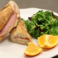 Le Parisien Sandwich · Ham, baby Swiss and salted butter.