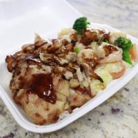 Chicken & Shrimp Combo · Chicken & shrimp topped with your choice of teriyaki sauce or hot garlic sauce along with yo...