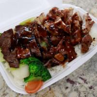 Chicken & Beef Combo · Chicken and beef topped with your choice of teriyaki sauce or hot garlic sauce along with yo...