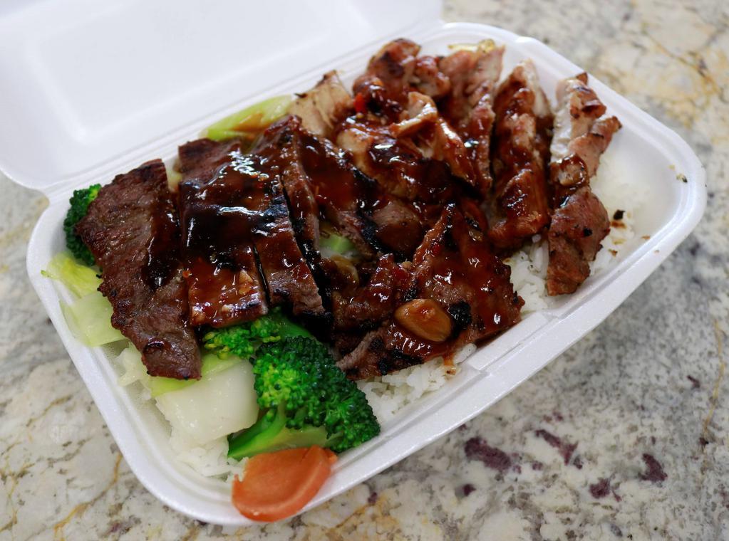 Chicken & Beef Combo · Chicken and beef topped with your choice of teriyaki sauce or hot garlic sauce along with your choice of rice, noodles, or vegetable only. Mixed vegetables are included with choice of rice or noodles.