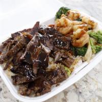 Beef & Shrimp Combo · Beef & shrimp topped with your choice of teriyaki sauce or hot garlic sauce along with your ...
