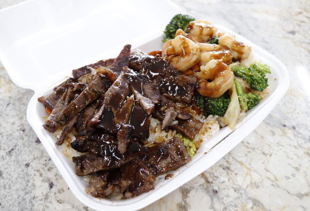Beef & Shrimp Combo · Beef & shrimp topped with your choice of teriyaki sauce or hot garlic sauce along with your choice of rice, noodles, or vegetable only. Mixed vegetables are included with choice of rice or noodles.