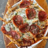 Pizza Fries · french fries smothered in pizza sauce, melty mozzarella cheese, and pepperoni slices. 