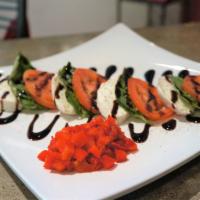 Caprese Salad · Fresh mozzarella, tomatoes, roasted red peppers, basil, extra virgin olive oil, balsamic gla...