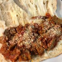Meatball Marinara Sandwich · Meatballs, marinara sauce, Parmesan and homemade fresh mozzarella.
