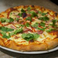 BBQ Pizza · BBQ sauce, mozzarella, grilled chicken, onions and cilantro.
