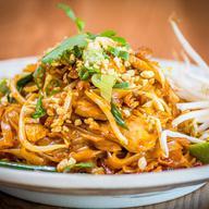 Pad Thai Dinner · Hot and spicy. Rice noodles, egg, green and red onions, beans sprouts, and chopped peanuts.