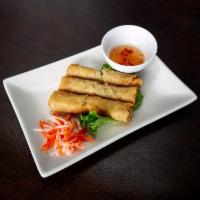 A1. Cha Gio Thit · Crispy egg rolls. 3 pieces of rolls. Crispy roll stuffed with ground pork, clear noodle, jul...