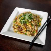 S39. House Special Fried Rice · House special fried rice with egg, peas, corn, diced carrots, and your choice of meat.