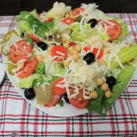 Italian Salad · Iceberg and Romaine Lettuce, Garbanzo Beans, Shredded Mozzarella Cheese, Black Olives, Fresh...