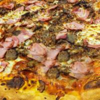 Meat Eater Pizza · Pepperoni, Italian Sausage, Ham, Ground Beef and Canadian Bacon.
