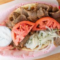 Lamb ＆ Beef Handheld · Thinly-sliced greek Gyros. Served on warm, hand-stretched pita