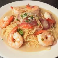 Shrimp Scampi · Sautéed  shrimp with roasted garlic, onions, parsley and white wine tossed with capellini pa...