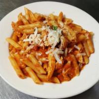 Chicken with Penne in rose blush sauce · Sauteéd chicken breast with cherry wine and roasted garlic. Tossed in a rose blush sauce and...