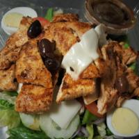 Angelino's Special Salad · Romaine lettuce with marinated chicken breast, plum tomatoes, red onions, Kalamata olives, c...