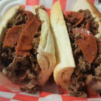 Pepperoni Cheesesteak · 8 oz. chopped sirloin steak. Served on long Italian roll. Steak with choice of cheese and sl...